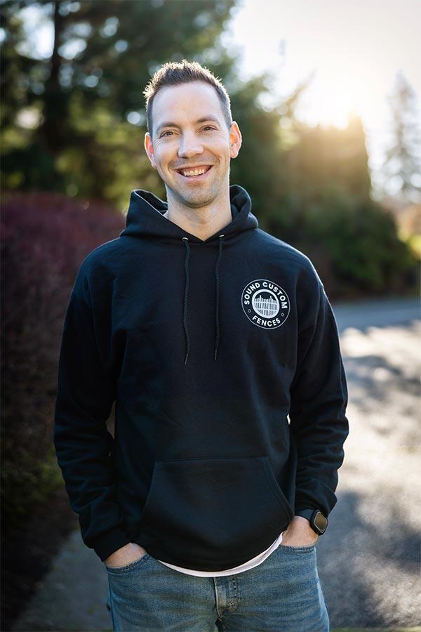 Andrew Duppenthaler with a quality wood fence installation