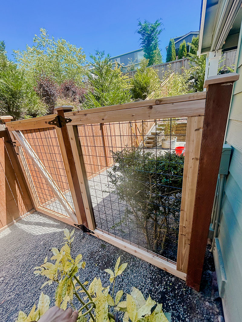Gig Harbor Black Hog Wire Cedar Fence Installation - Hog Wire Fence Installation - Image 4 in Gig Harbor, Washington